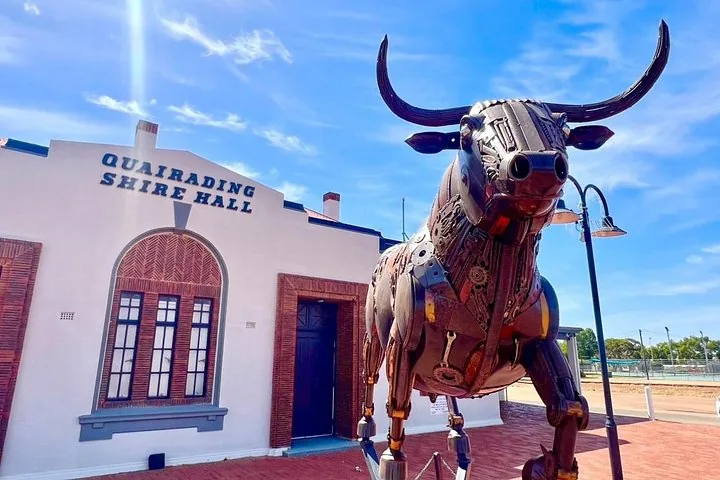 A large metal bull sculpture stands outside the Quairading Shire Hall.